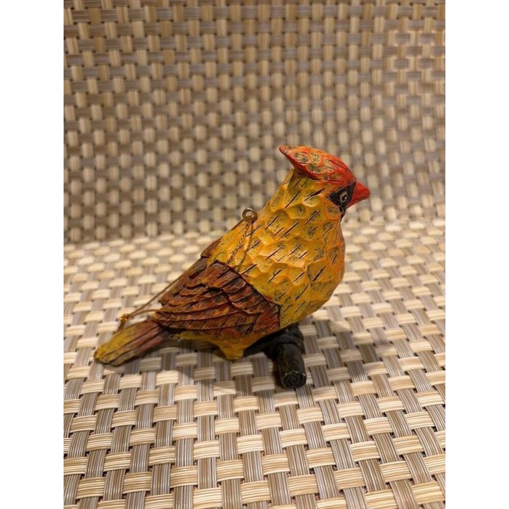 hand-carved and hand-painted wooden female cardinal ornament